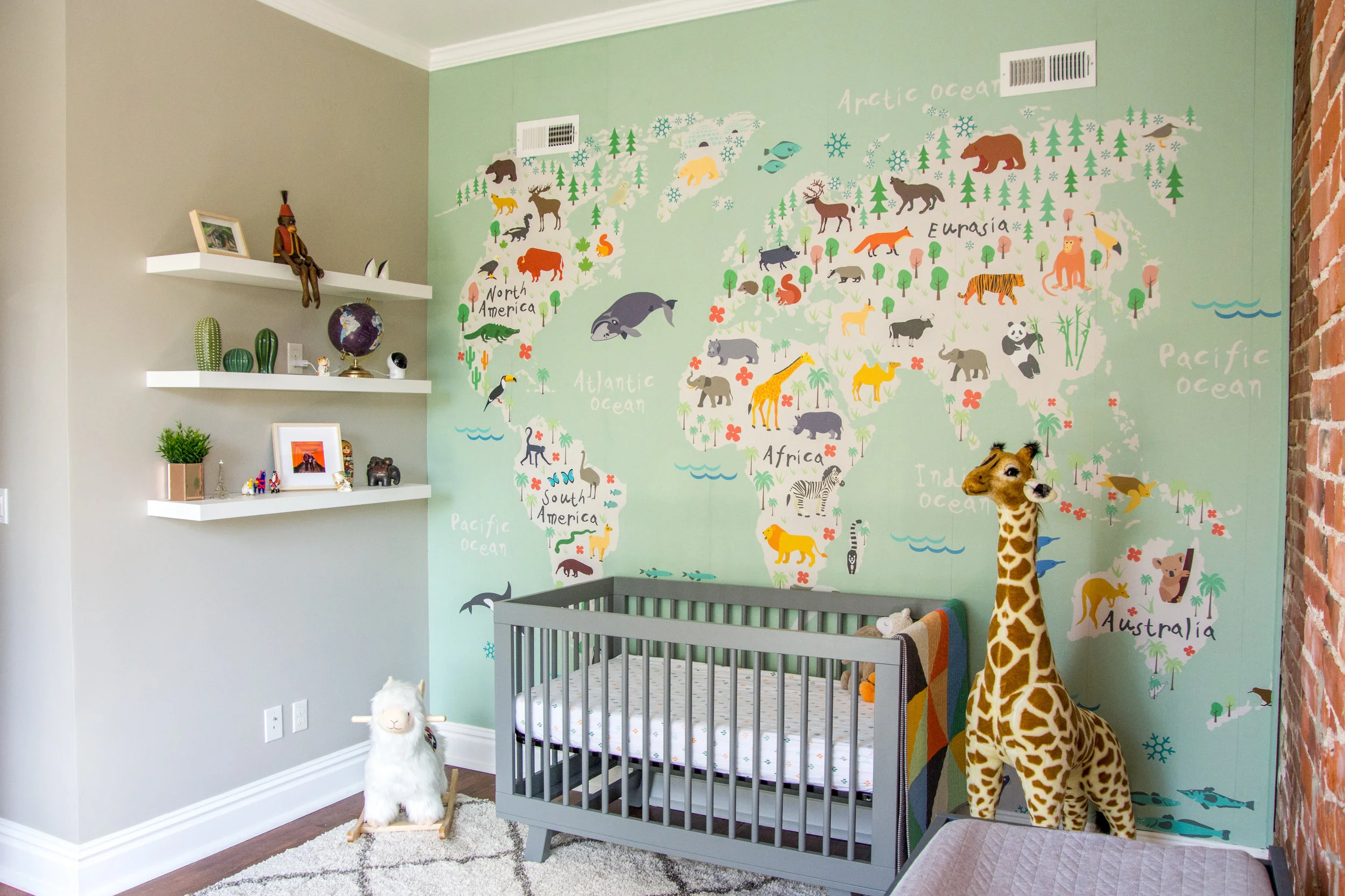 A Gender Neutral Travel Inspired Nursery Modern Animal Safari